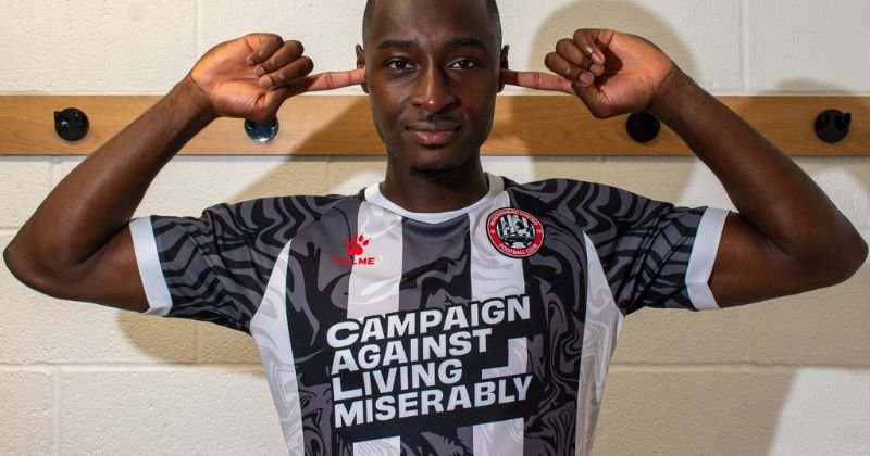 player wearing maidenhead united 2023-24 home shirt in black and white stripes